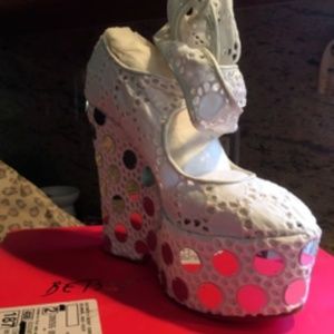 Wedged Fabric shoes by Betsey Johnson